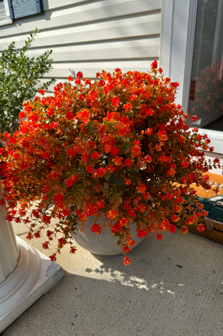 large outdoor artificial flowers in pots